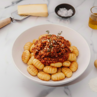 Ñoquis con salsa Bolognesa